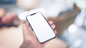 hand holding a phone