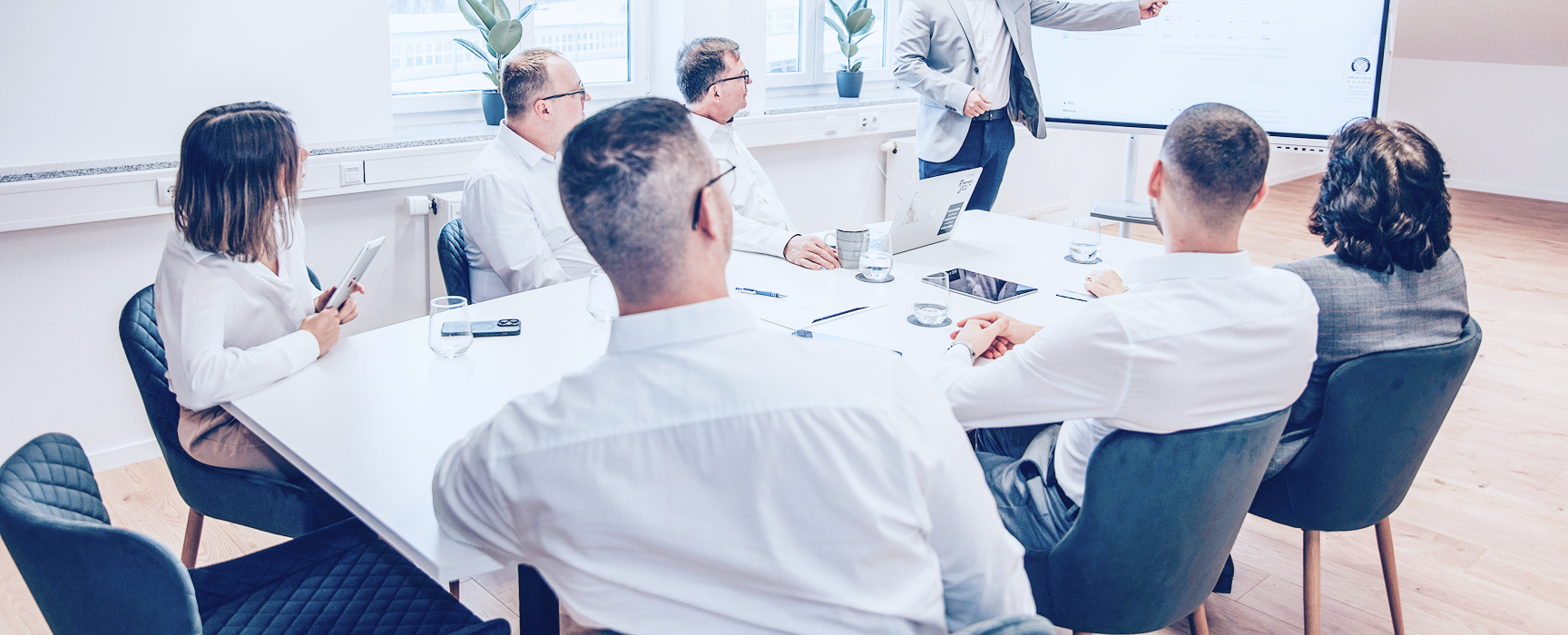 People sitting in a meeting room in a training